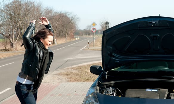 Woman has a car breakdown