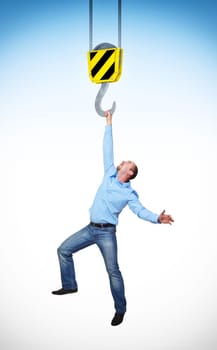 caucasian man hant to crane hook