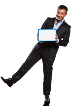 one caucasian business man holding showing whiteboard full length in studio isolated on white background