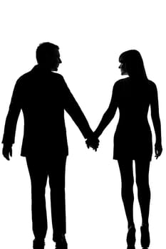rear view one lovers caucasian couple man and woman walking hand in hand in studio silhouette isolated on white background