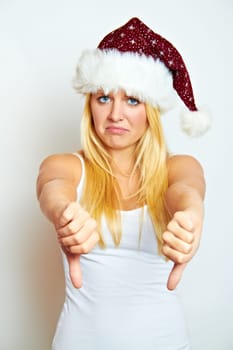Frustrated Santa Claus with thumbs down