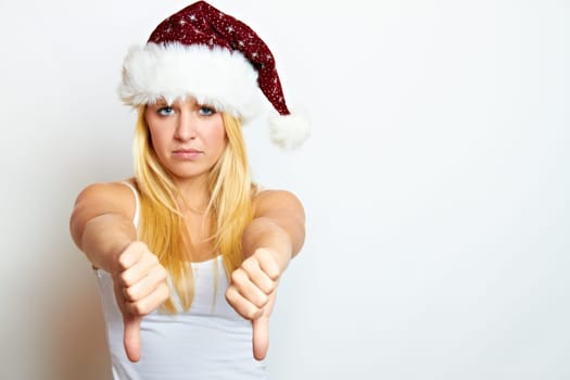 Frustrated Santa Claus with thumbs down