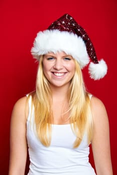 Laughing young beautiful woman at christmas