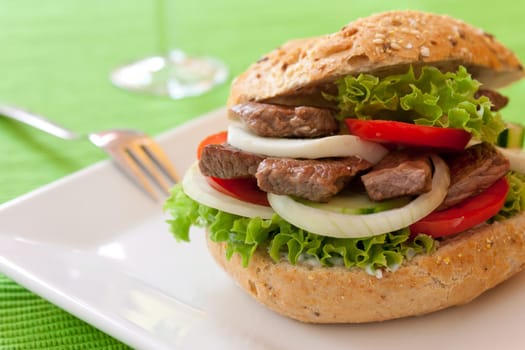 Fresh and healthy sandwich with vegetables and beef sliced