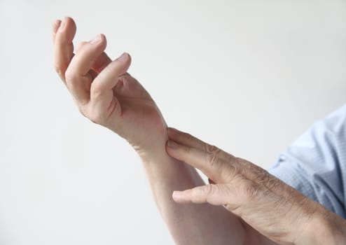 man with pain in his wrist area