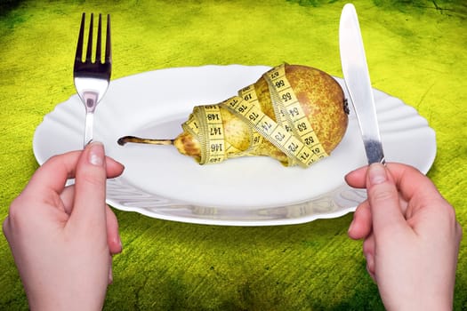 female eating healthy pear