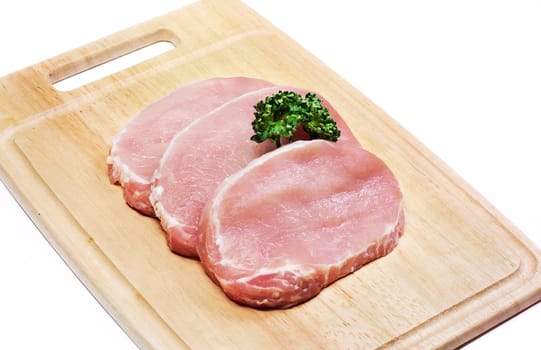 Fresh slices of pork isolated on white