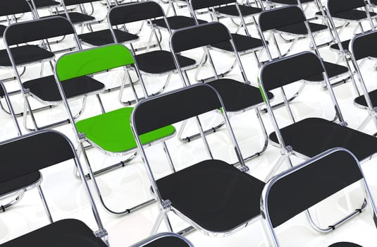 A folding chair in the crowd Green Black