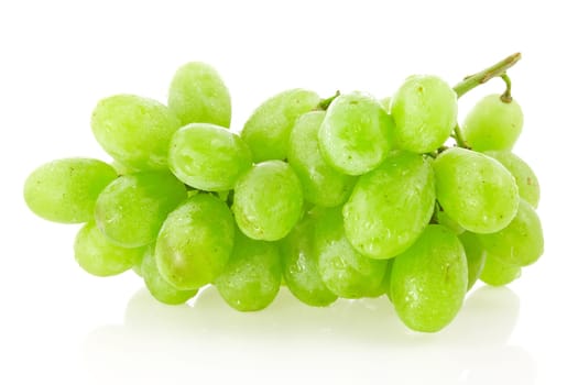 Fresh green grapes over a white background