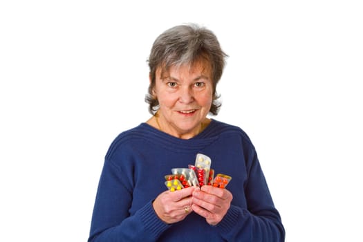 Senior woman with tablets - isolated on white background