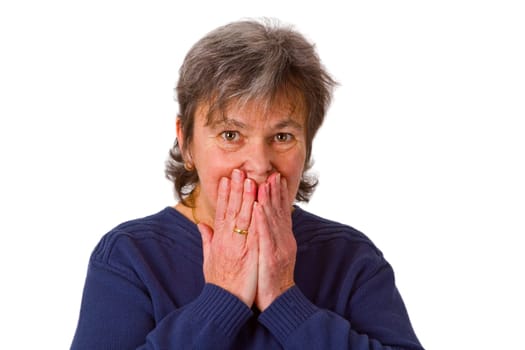 Senior woman covers her mouth - isolated on white background