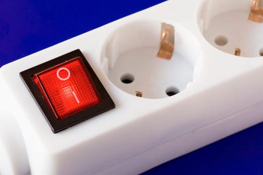 electric extension cord with red switch button