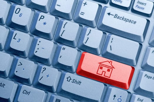 red computer keyboard button with house icon
