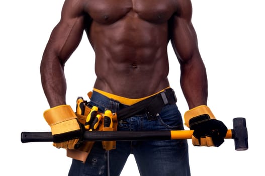 Body part of a strong build black construction worker with big hammer isolated in white