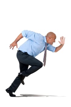 Businessman running against a white background