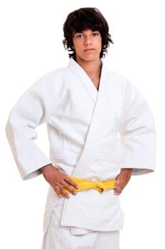 Young fighter posing against a white background