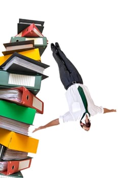 Businessman with swimming gear diving from platform made of files
