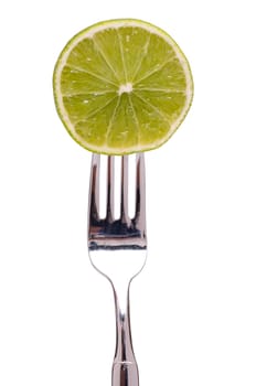 A slice of lime on a fork