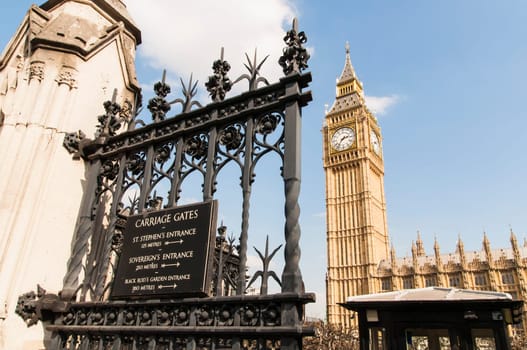 Detail shot of notice board at the gates of Houses of Parliament in London, with Big Ben in the background.