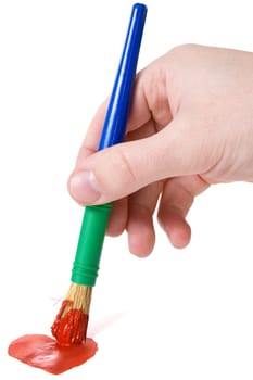hand with paintbrush paint red heart on white background