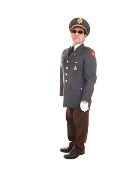 A Hispanic man in a uniform jacket, cap and white cloves and  sunglasses standing in the studio for white background.