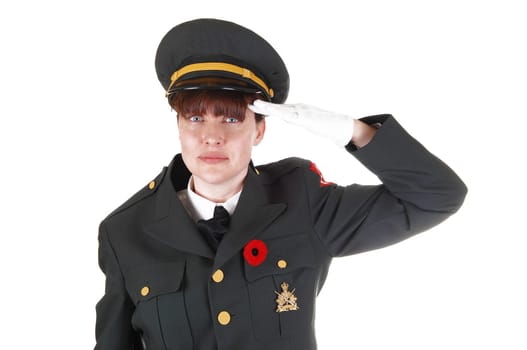 A woman in a military uniform saluting, with white cloves and a cap for white background in the studio.