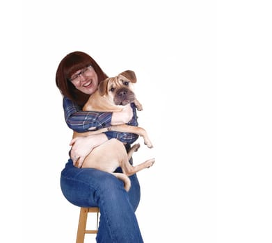 Woman hugging her dog.