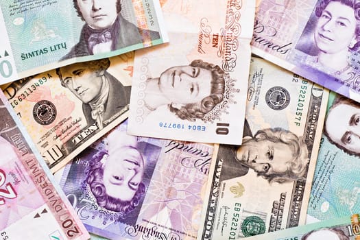 money background made from a different currencies