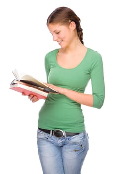 Studio shot of a young student with books