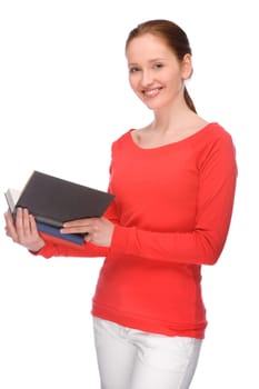 Studio shot of a young student with books