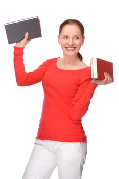 Studio shot of a young student with books
