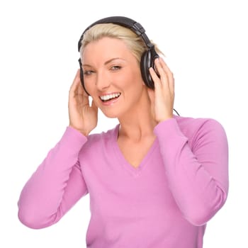 Studio shot of a young woman wearing headphones