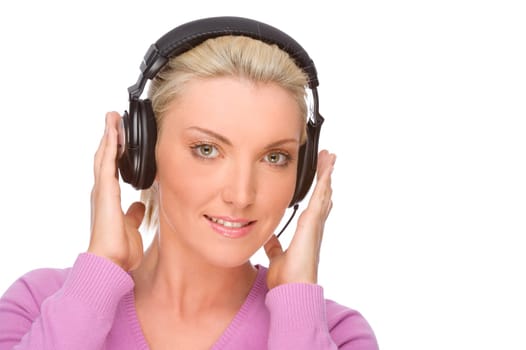 Studio shot of a young woman wearing headphones