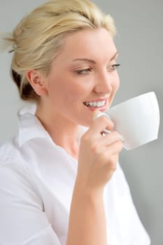Young woman with a cup of coffee