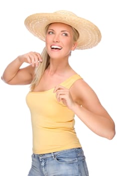 Studio shot of a young woman in a straw hat