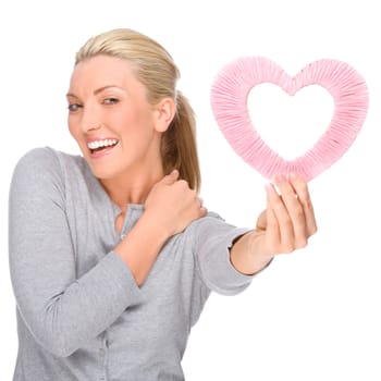 Studio shot of a young woman with a heart