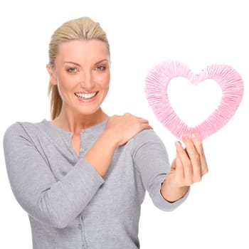 Studio shot of a young woman with a heart