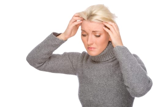 Studio shot of a young woman with a headache