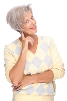 Studio shot of an active and happy senior woman