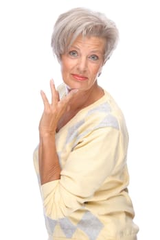 Studio shot of an active and happy senior woman