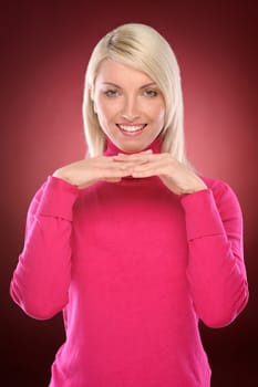 Studio shot of a young woman with a colored background