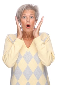 Studio shot of an active and happy senior woman