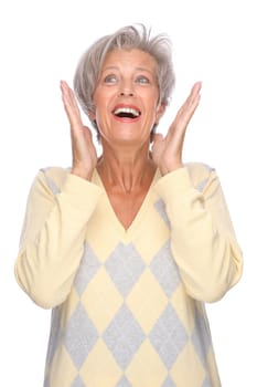 Studio shot of an active and happy senior woman