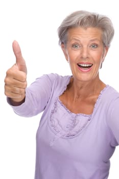Studio shot of an active and happy senior woman