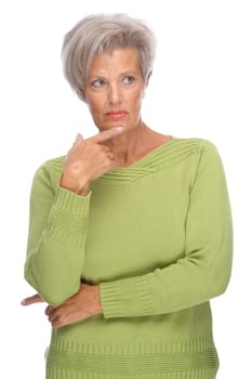 Studio shot of a thoughtful senior woman