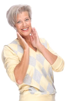 Studio shot of an active and happy senior woman