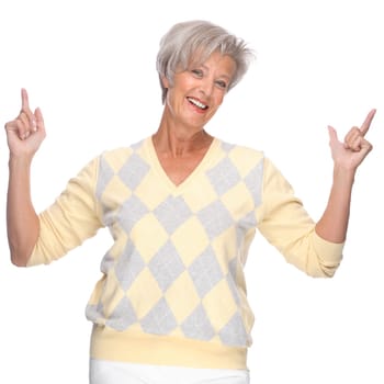 Studio shot of an active and happy senior woman