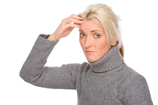 Studio shot of a young woman with a headache