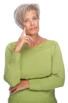 Studio shot of a thoughtful senior woman