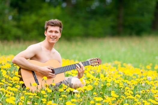 Young man with a guitar